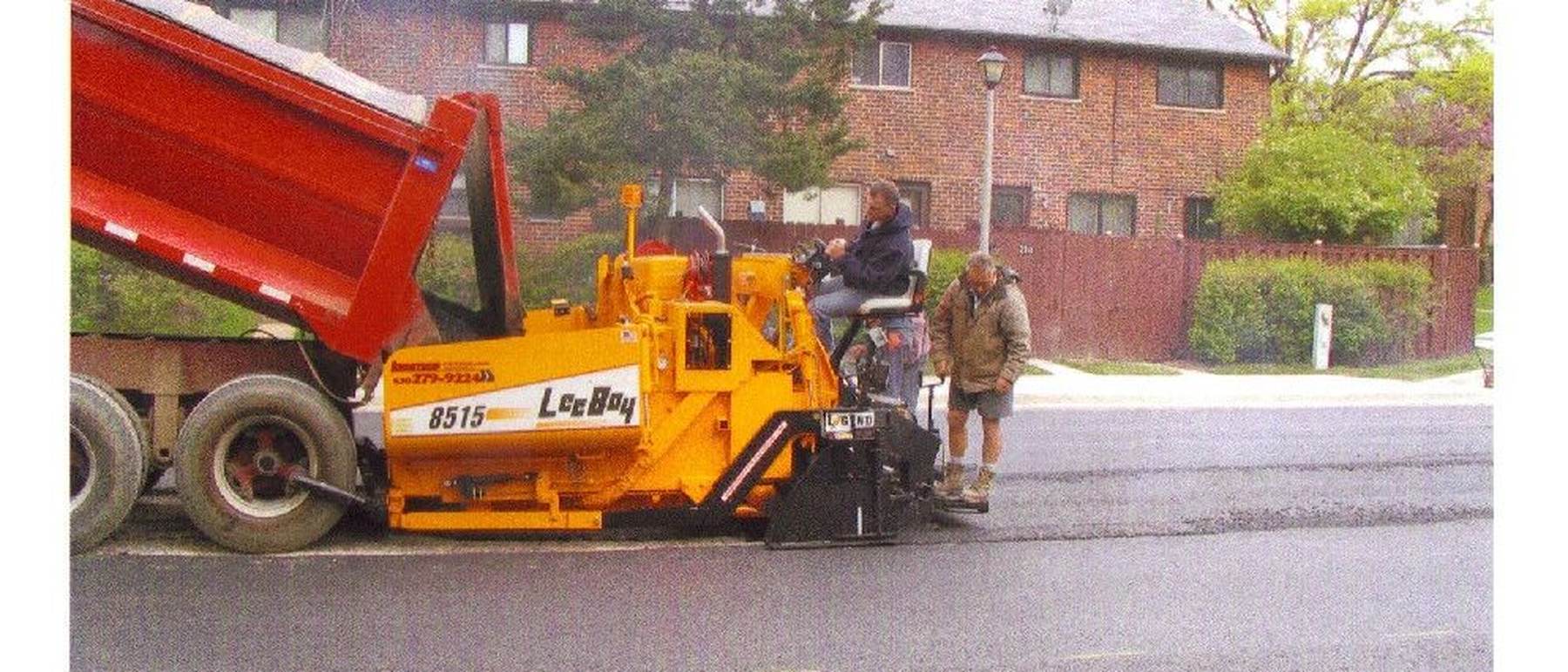 Our crew laying hot mix at an apartment complex